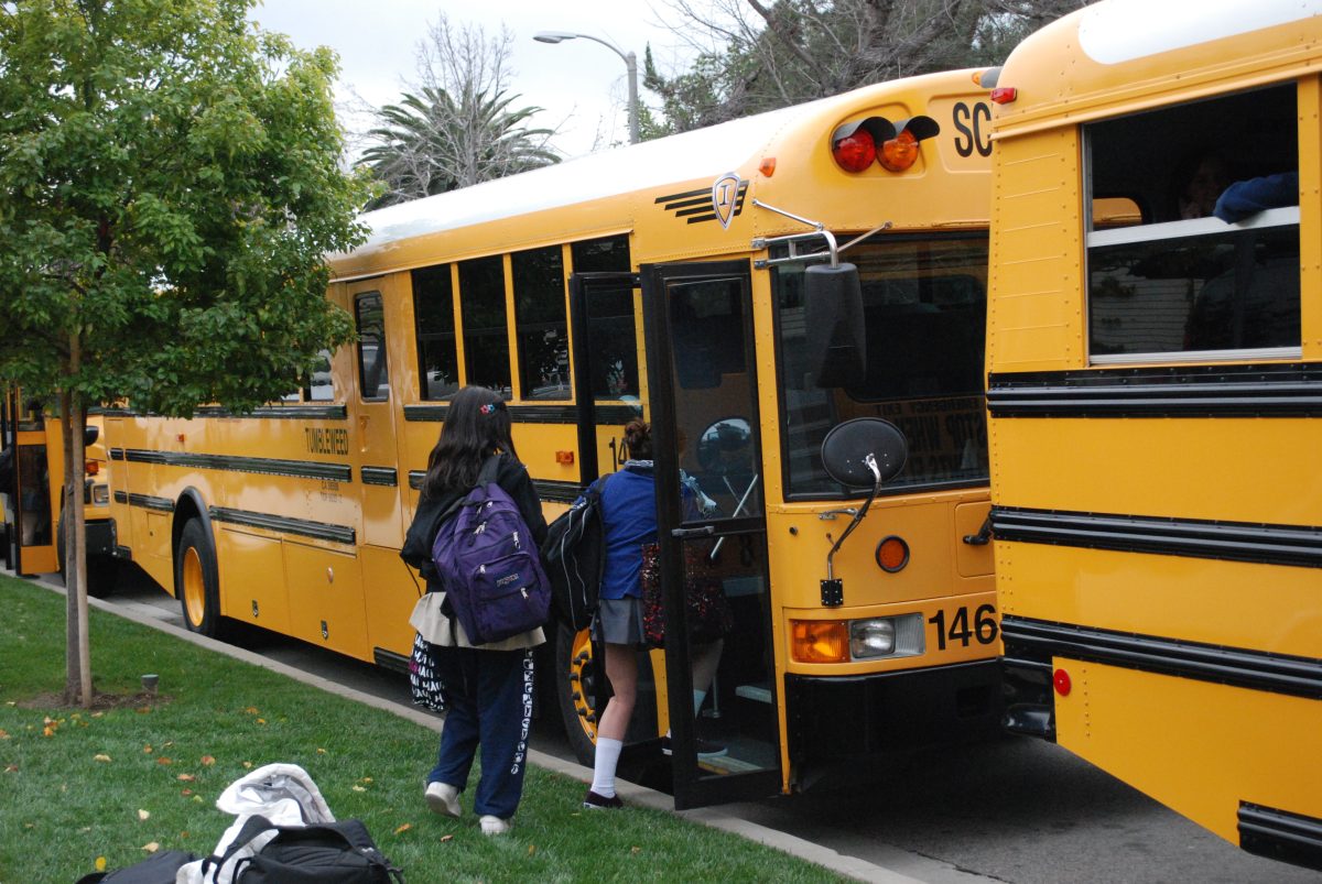 NEW RULES: Students hop on the Westside bus after school. This year, Tumbleweed has increased the enforcement of the code of conduct to some studens surprise. Photo by Tahirah 12