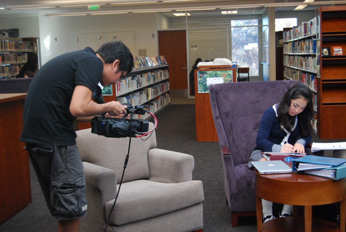 FILMING DAY: April 13 is filmed for Young Icons as she studies in the Academic Resource Center. The Young Icons crew wanted to film the profiled students in their natural environment. Photo by Ileana Najarro