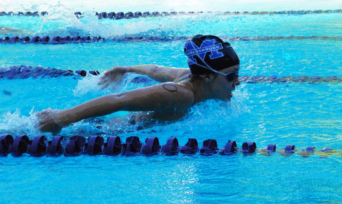 BUTTERFLY: Christina 12 powers through the water in the 200 Individual Medley against Ramona Convent Mar. 22. Photo by Tahirah