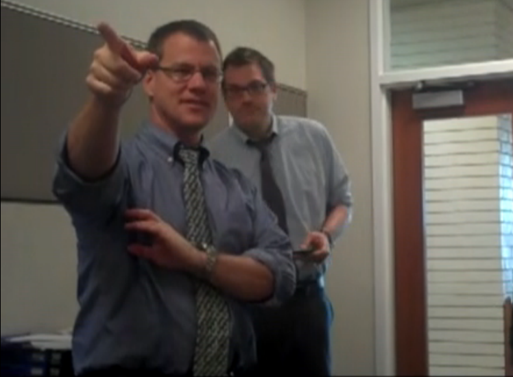 Dr. Millar and Mr. Ridge attempt to use the faculty copy machine. 
