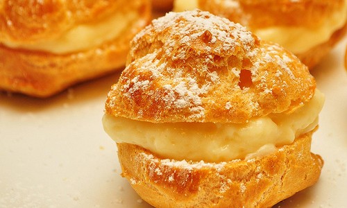 A light and fluffy cream puff ready to eat. Photo by flickr user jeffreyw.