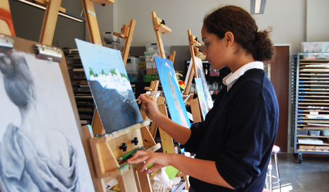 ART IN ACTION: Olivia FitzGerald Harewood paints a landscape in D-108. Photo by Erika 12. 