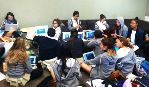 Second semester seniors socialize and complete homework in the senior lounge. Photo by Sammy 12. 