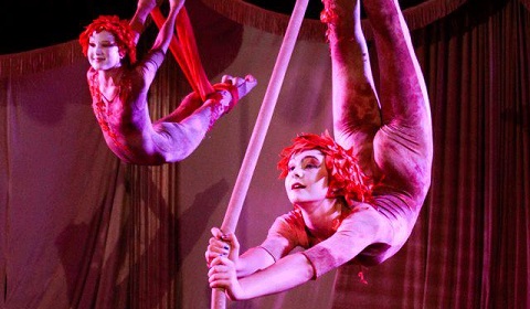 Cleo Schoeplein ’16 executes a rope routine at Le Studio with fellow performer Sophia, wearing their Le Petit Cirque signature unitard and red wigs. 