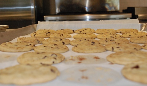 The famous chocolate chip cookies infuse Café M with their mouth-watering scent, inspiring girls to splurge on an after-meal treat. Photo by Kayleigh '18 / Staff Photographer