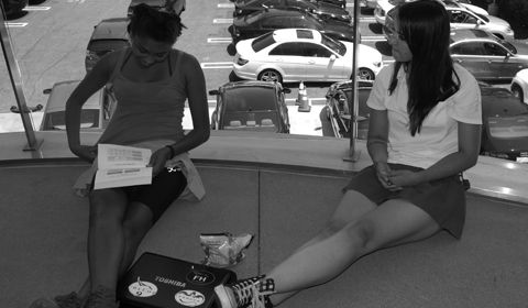 Vinnie '13 and Ashley '13 relax outside the Senior Living Room as Second Semester Seniors. 