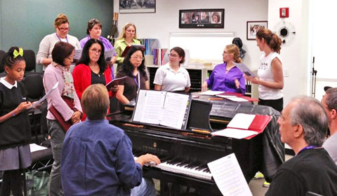 The Marlborough Community Chorus rehearses during lunch. Photo courtesy of Chris Colthart.