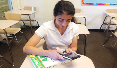 Natalie '16 calculates on the TI-Nspire. Photo by Sarah '16. 