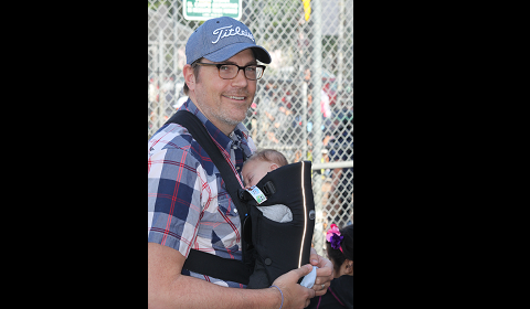 Rindge brought Jude to his first Marlborough softball game on May 8. Photo by Alison Moser. 