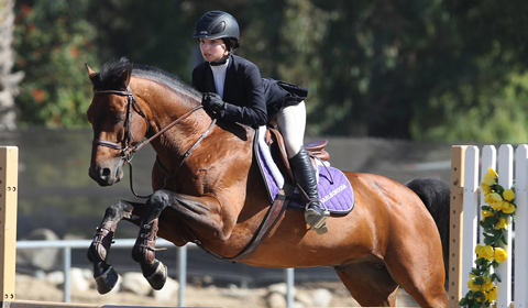 Nina 16 rides her horse to victory. Photo by Chris Colthart