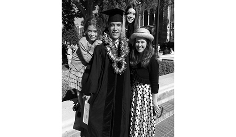 Kessners family congratulates him at his graduation.
