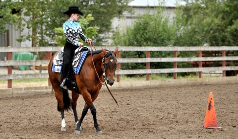 Alyx 15 rides her old horse Daisy in Watsonville, CA. 