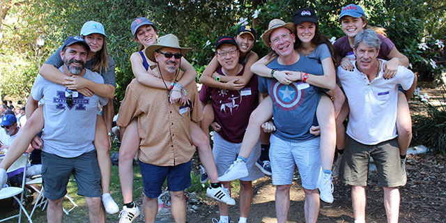 Attendees have a blast at the Father-Daughter Picnic, despite high temperatures. Photo by Tiffany '16