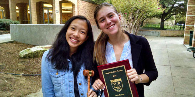 Grace '17 (left) and Annie '16 (right) celebrate their Greenhill victories. Photo by Adam Torson.