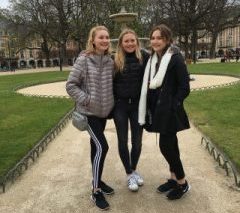 Olivia 19, Caroline 19 and Joely 19 stand in the Place des Vosges in Les Marais, Paris, on a Marlborough foreign exchange trip. Photo by Olivia 19.