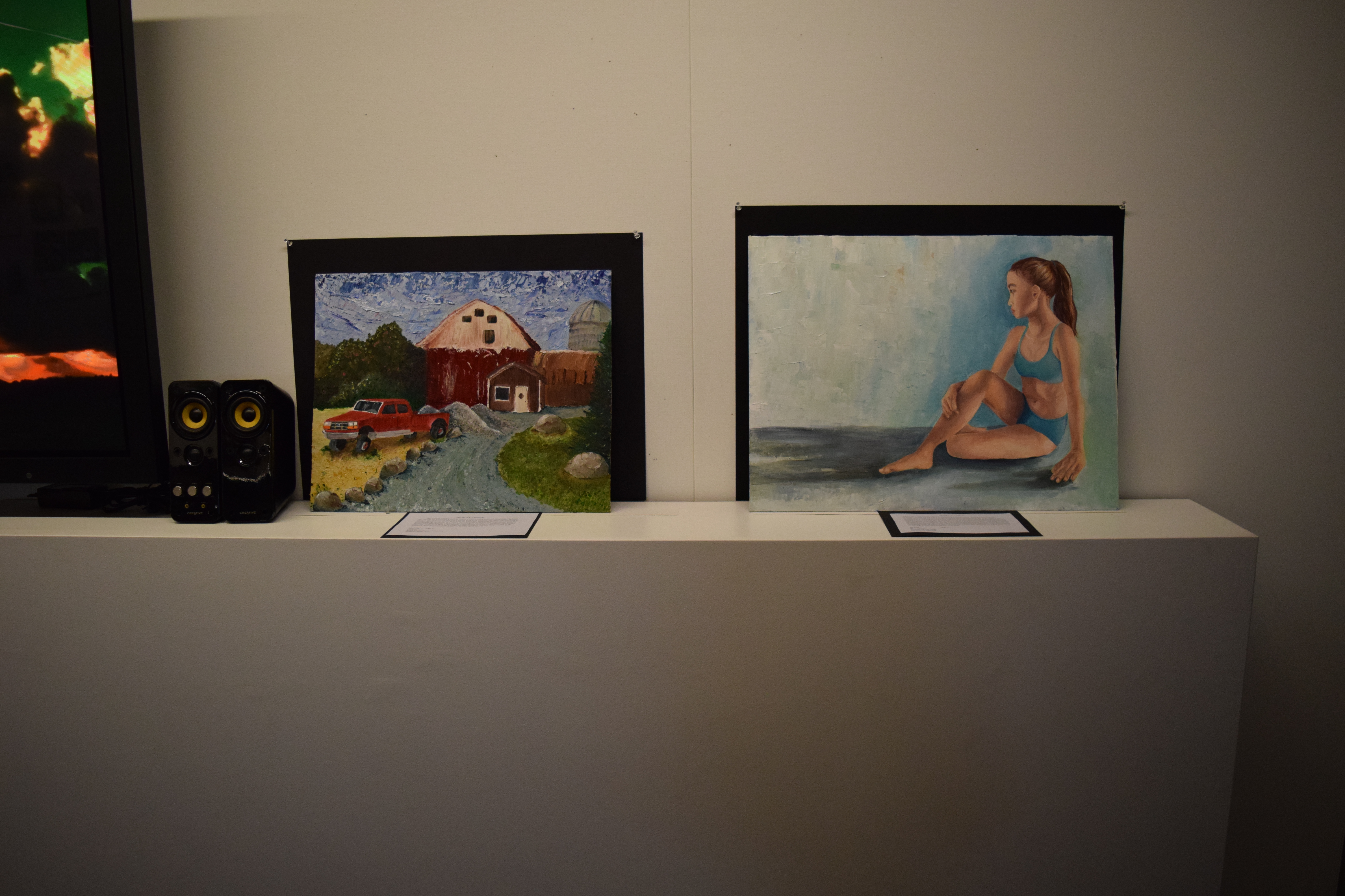 Paintings by Lily '18 and Alli '17.