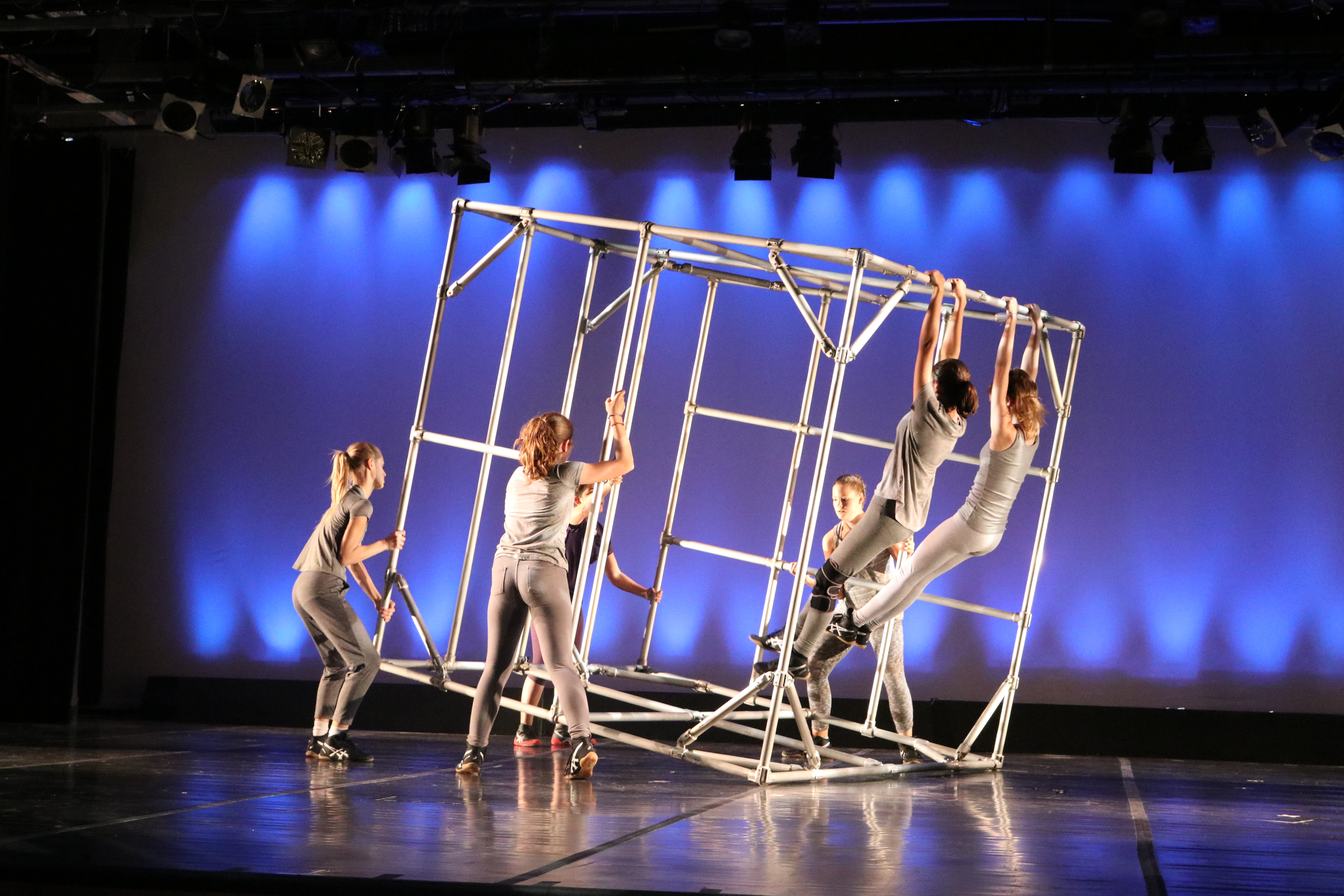 Students use a metal box inspired by the dance company Diavolo.