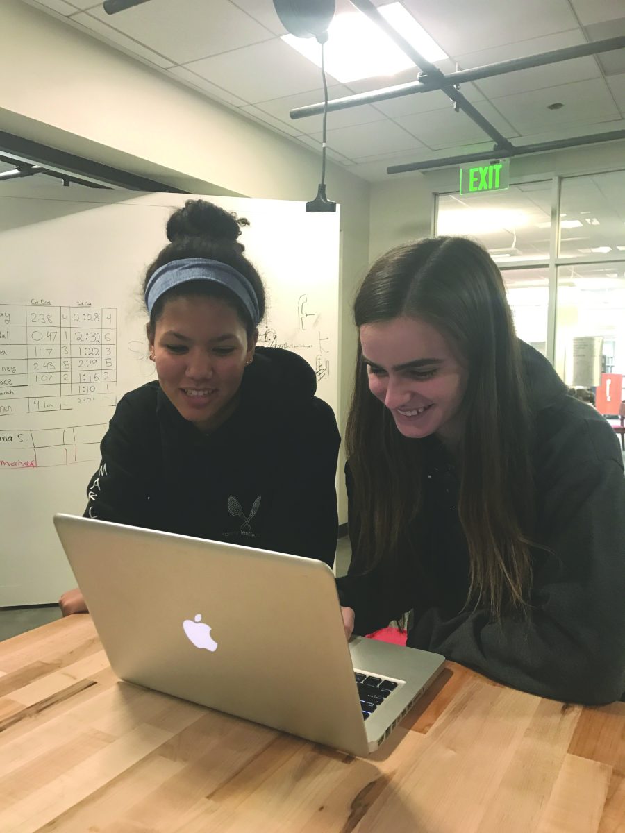 Bella 17 and Elizabeth 17 work on their coding project. Sora Lee Contributing Photographer