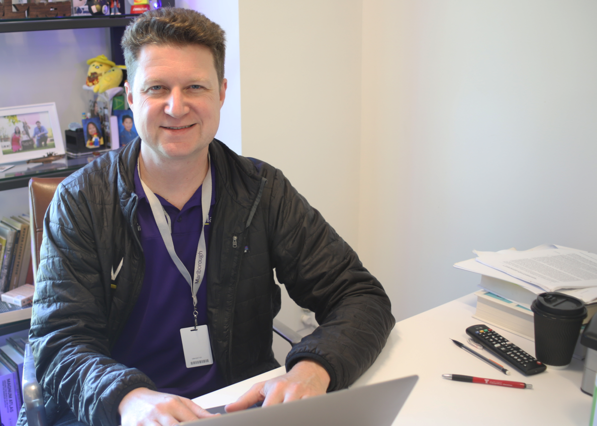 Daniel Lynch completes work in his office.